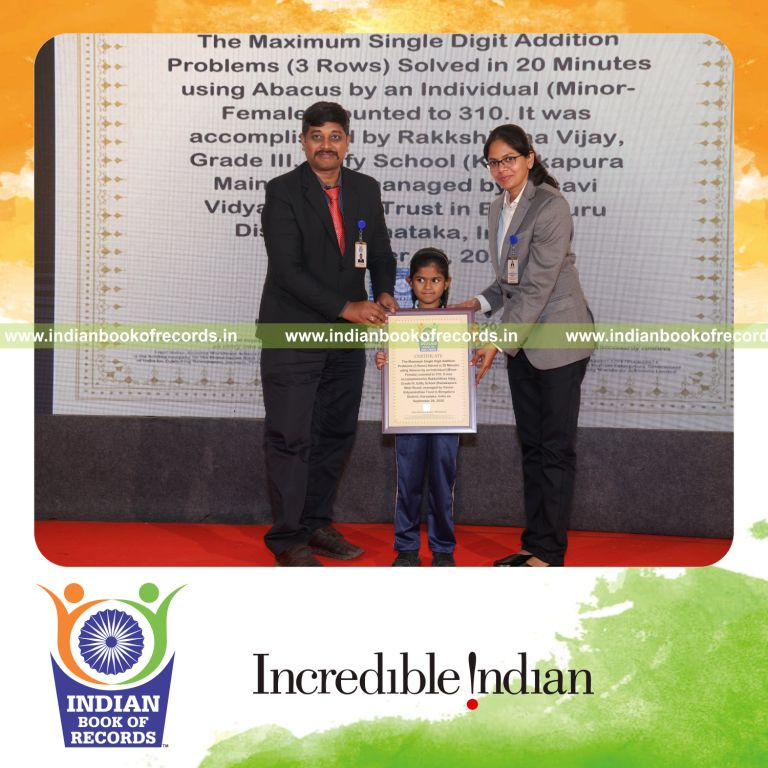 Young girl solving single-digit addition problems using an abacus recognized by Indian Book of Records