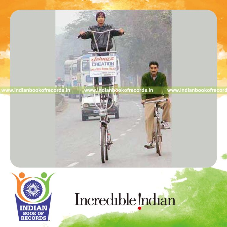 male individual creating a very large bicycle for record in Indian Book of Records