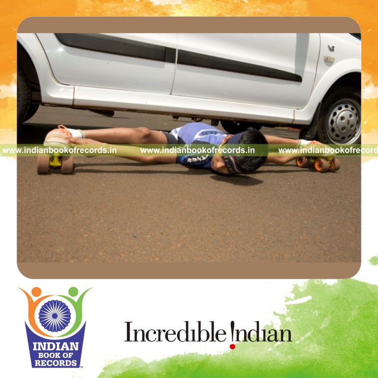 person performing limbo skating while blindfolded for record in Indian Book of Records