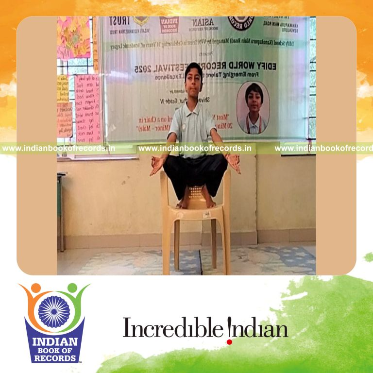 Young boy performing multiple yogasanas on a chair in a timed session recognized by Indian Book of Records
