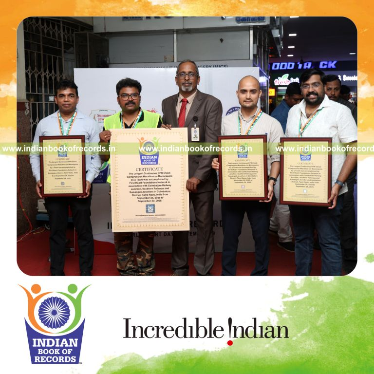 Participants continuing CPR chest compressions on mannequins over an extended duration recognized by Indian Book of Records