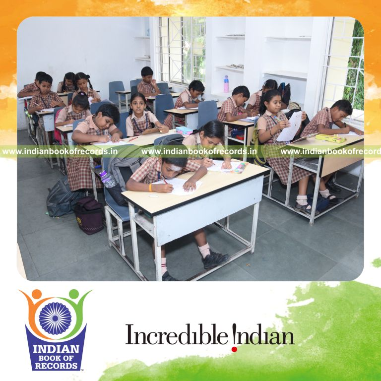 a team creating multiple dot to dot drawings within one hour in a coordinated activity for an record in Indian Book of Records