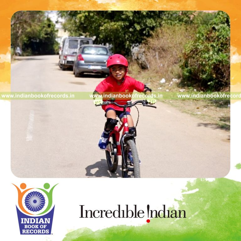 Cyclist completing a 10 kilometer ride in record time recognized by Indian Book of Records