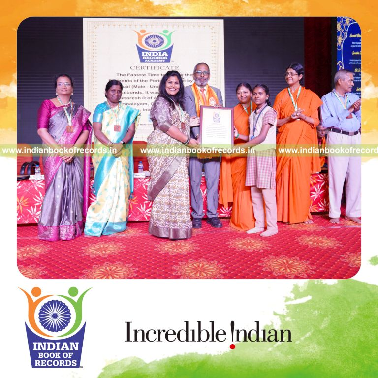 an individual female under fourteen reciting elements of the periodic table in the shortest time for a record in Indian Book of Records