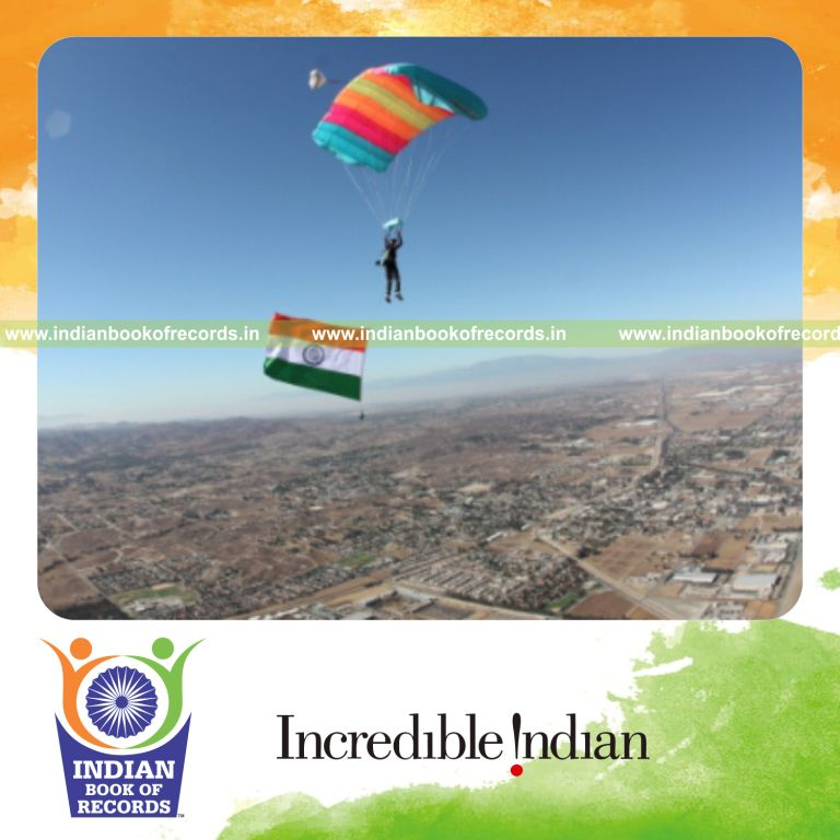 female diver unfurling indian national flag during skydive for record in Indian Book of Records