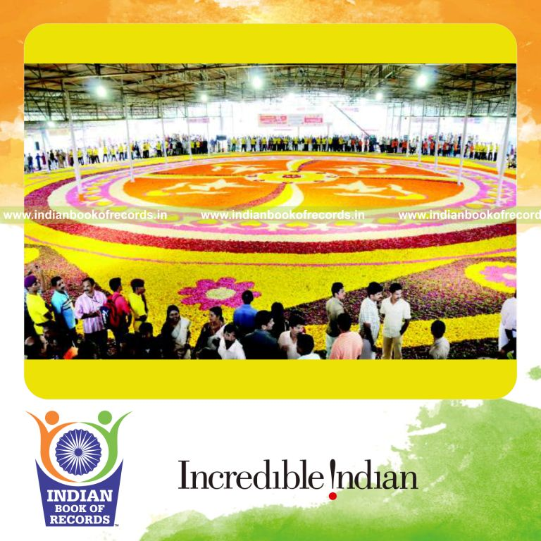 large decorative floral carpet displayed for record recognition in Indian Book of Records