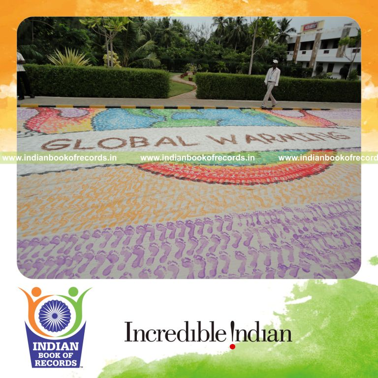 team of minors creating a large footprint painting for record in Indian Book of Records
