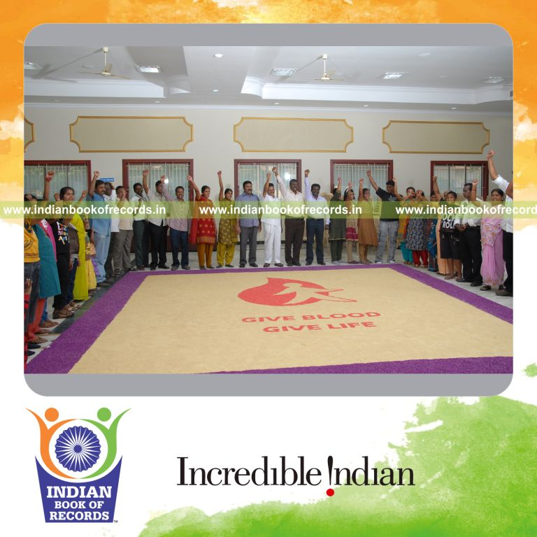 team creating a large rice mosaic artwork for record in Indian Book of Records
