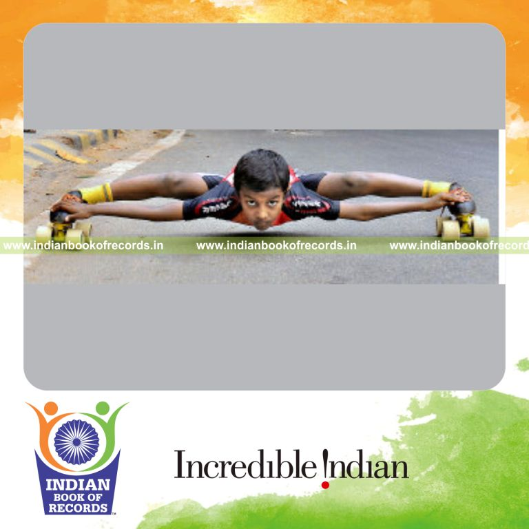 young male performing backward limbo skating under bars for record in Indian Book of Records