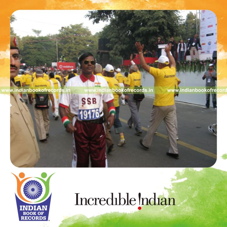 male individual running backward continuously for record achievement in Indian Book of Records