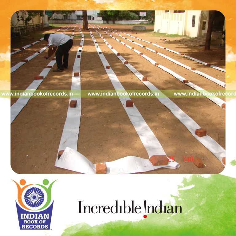 team creating an extended cartoon strip for an record achievement in Indian Book of Records