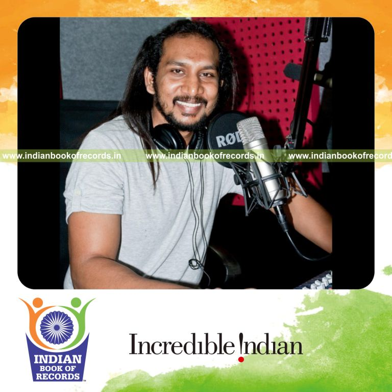 male individual performing extended radio jockeying marathon for record in Indian Book of Records