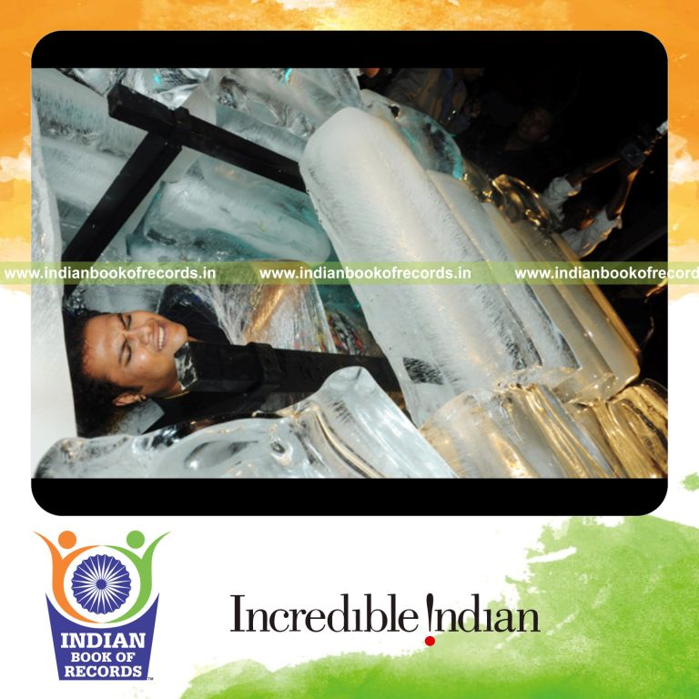 male individual staying inside ice coffin for extended duration for record in Indian Book of Records