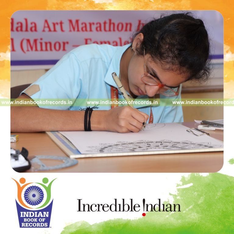 Young girl creating mandala artworks continuously over a long period recognized by Indian Book of Records