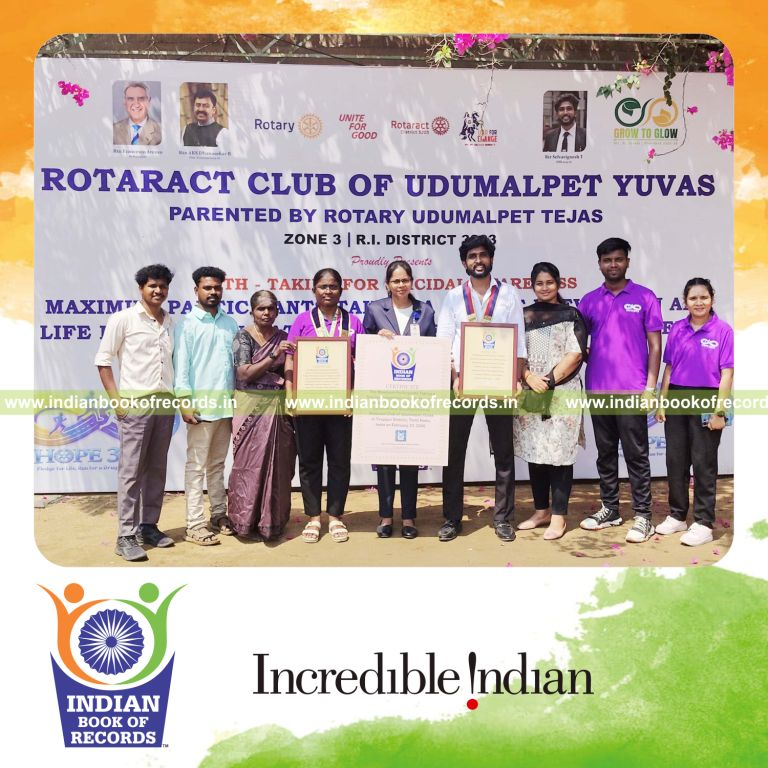 Massive group participating in a life protection pledge event simultaneously at a single venue recognized by Indian Book of Records