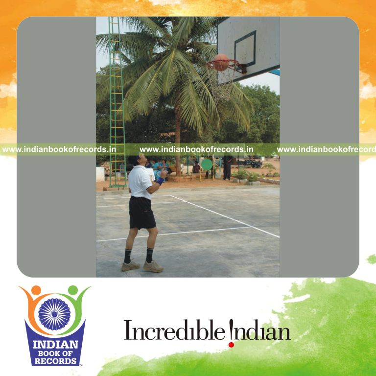 male individual scoring basketball baskets repeatedly within one hour for record in Indian Book of Records