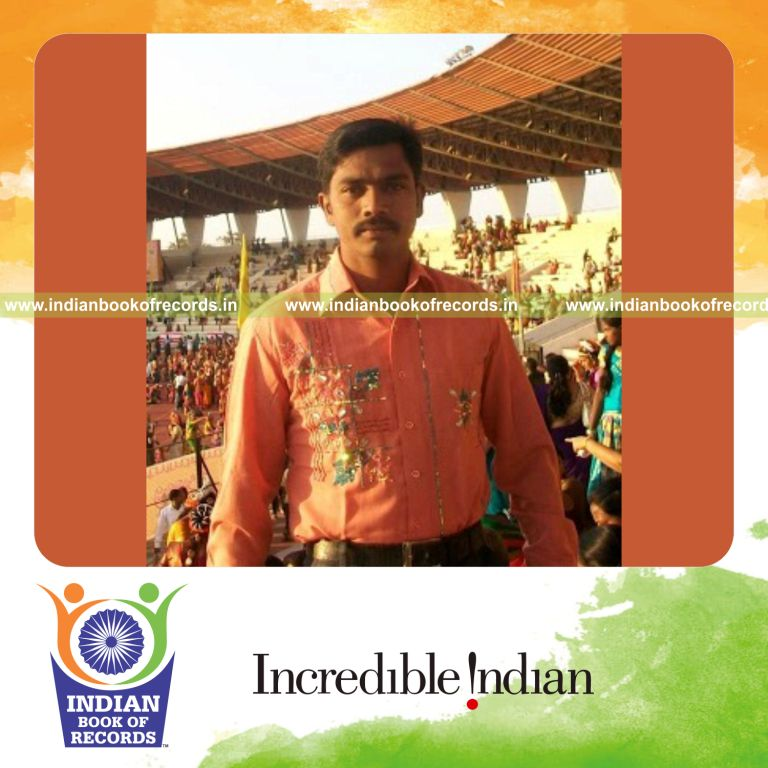 male individual breaking multiple concrete blocks using spinning huck kick for record in Indian Book of Records