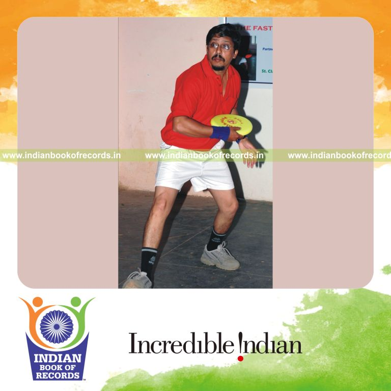 male individual performing double frisbee rallies within one minute for record in Indian Book of Records