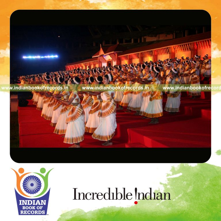 group of participants performing mohiniyattam dance at a single venue for record in Indian Book of Records