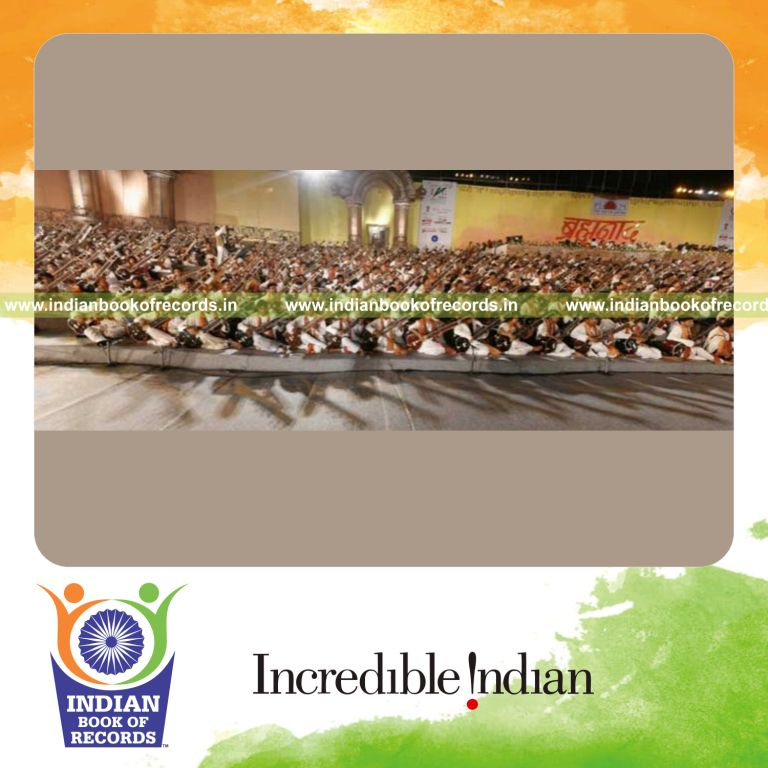 group of participants performing sitar ensemble at single venue for Indian Book of Records