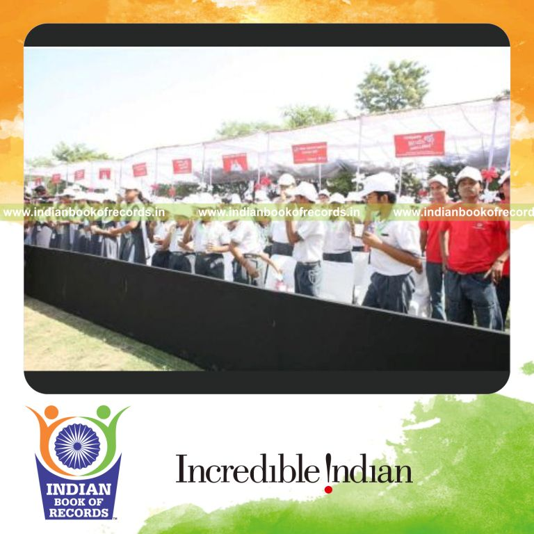 group of people brushing teeth simultaneously across multiple venues for record in Indian Book of Records