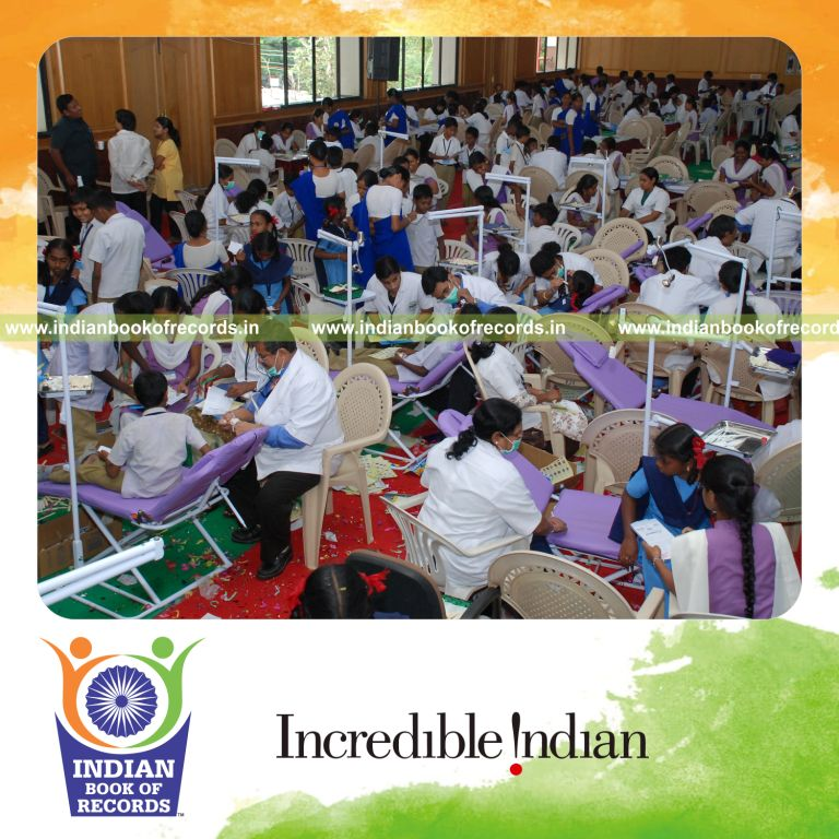 group of people participating in dental health checkup at single venue for record in Indian Book of Records