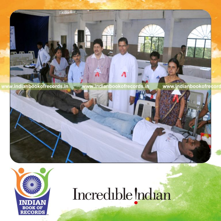 group of people donating blood across multiple venues for record in Indian Book of Records