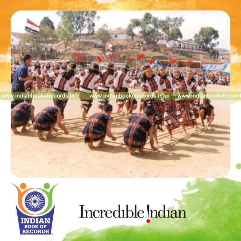 group of people performing cheraw dance simultaneously at single venue for record in Indian Book of Records