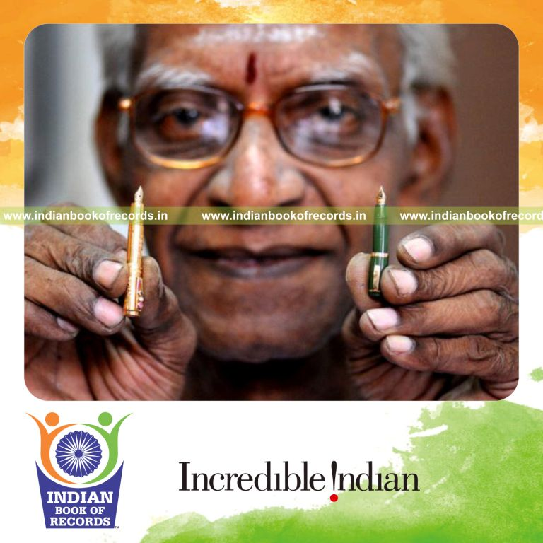 male individual creating miniature gold fountain pen for record in Indian Book of Records