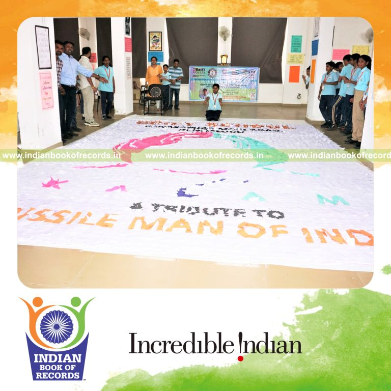 Large mosaic artwork made of numerous origami houses created by a young artist recognized by Indian Book of Records