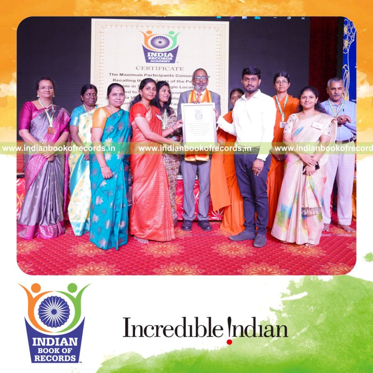 a continuous sequence of people recalling elements of the periodic table one after another for twelve hours at a single location for a record in Indian Book of Records