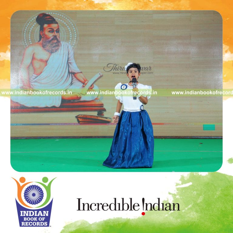 Young child reciting Thirukkural verses rapidly during a timed performance recognized by Indian Book of Records