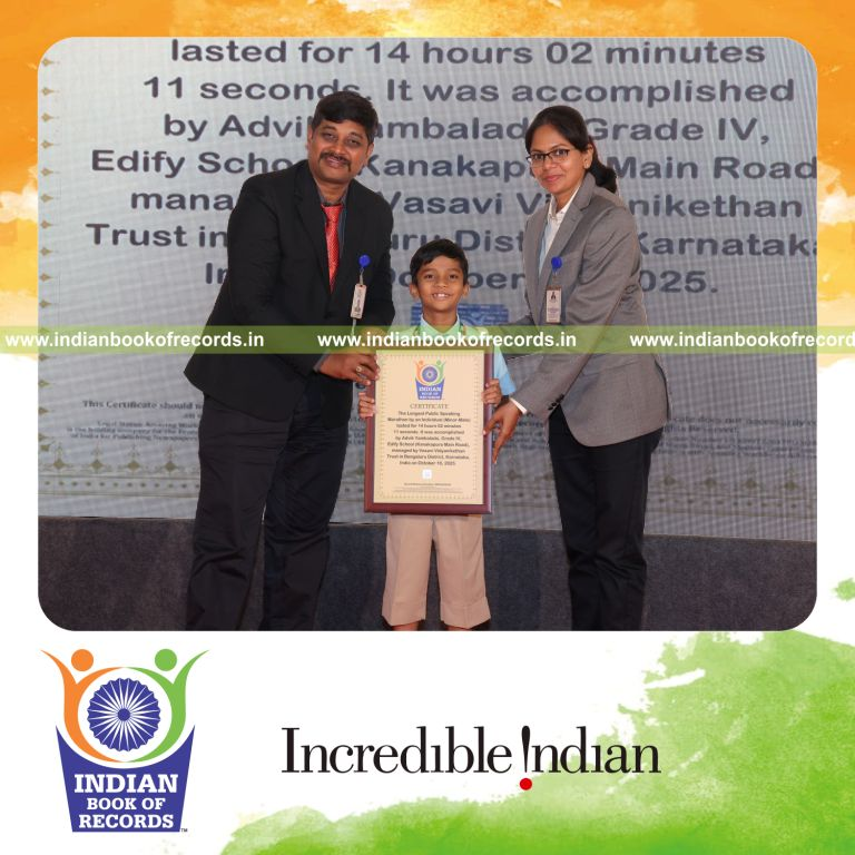 Young boy delivering continuous speech during a marathon session recognized by Indian Book of Records