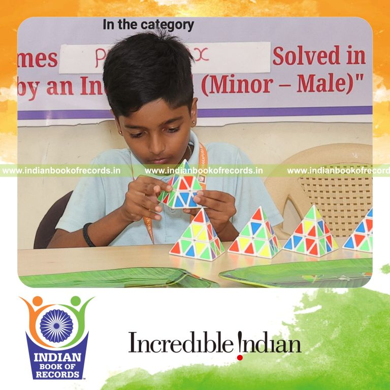 Young participant solving a Pyraminx puzzle repeatedly over three hours recognized by Indian Book of Records