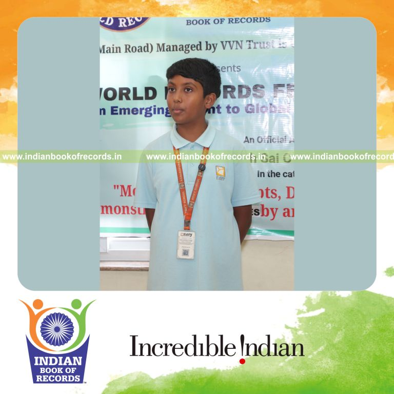 Young boy demonstrating numerous science concepts and formulas rapidly recognized by Indian Book of Records