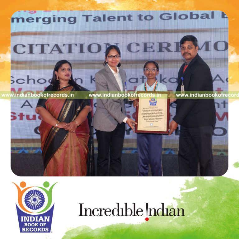 Young girl reciting numerous shlokas quickly in a timed session recognized by Indian Book of Records