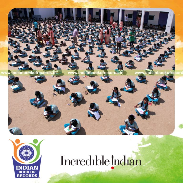 Team members coloring a large number of images within one hour at a single venue recognized by Indian Book of Records
