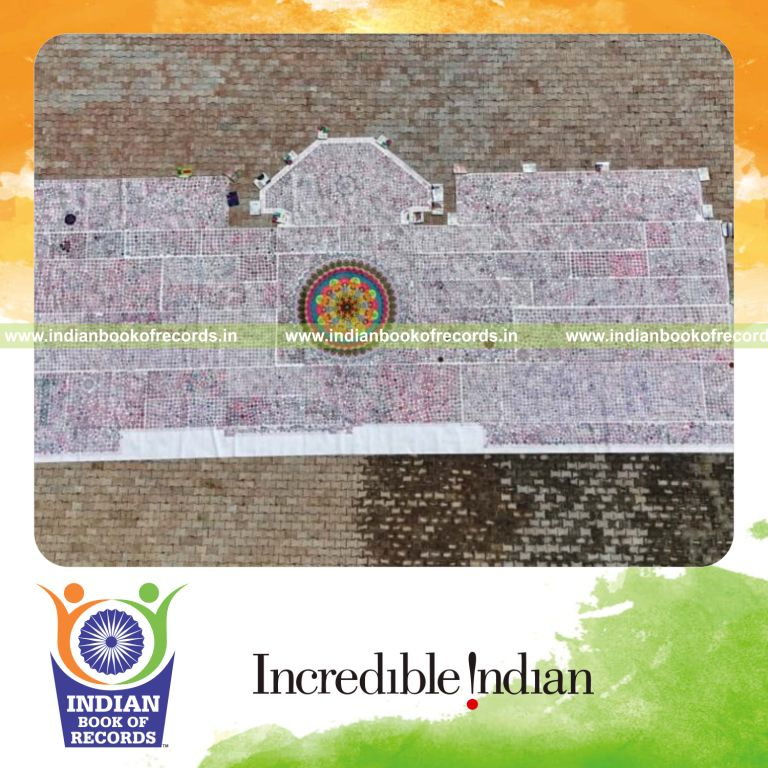 Team creating a large number of intricate mandala artwords designs recognized by Indian Book of Records