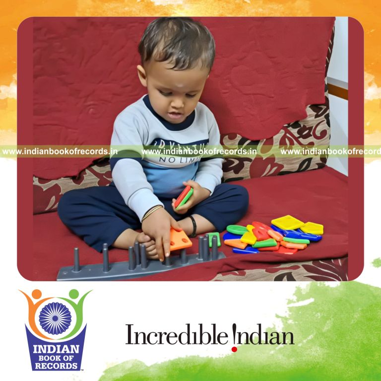 Toddler quickly identifying multiple shapes in a timed activity recognized by Indian Book of Records