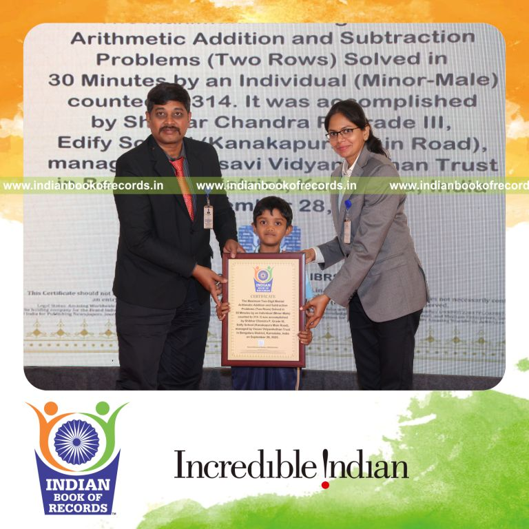 Participant solving two-digit arithmetic addition and subtraction problems recognized by Indian Book of Records