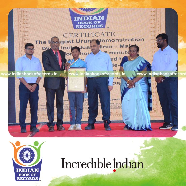 Individual performing an extended urumi martial arts demonstration recognized by Indian Book of Records