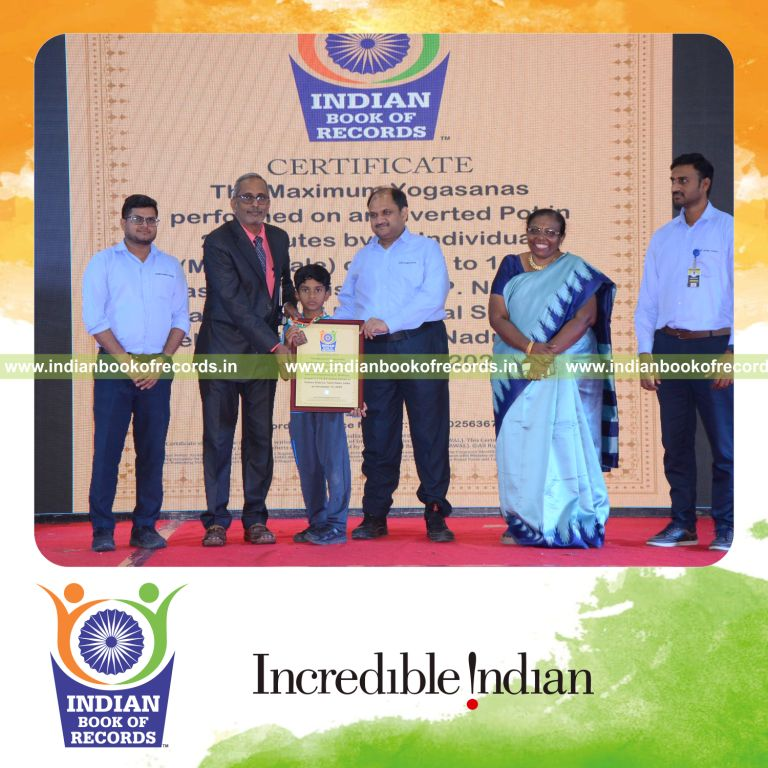 Individual performing multiple yoga poses while balancing on an inverted pot within a short time recognized by Indian Book of Records