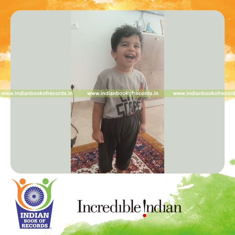 Young child singing the Indian national anthem in a performance recognized by Indian Book of Records